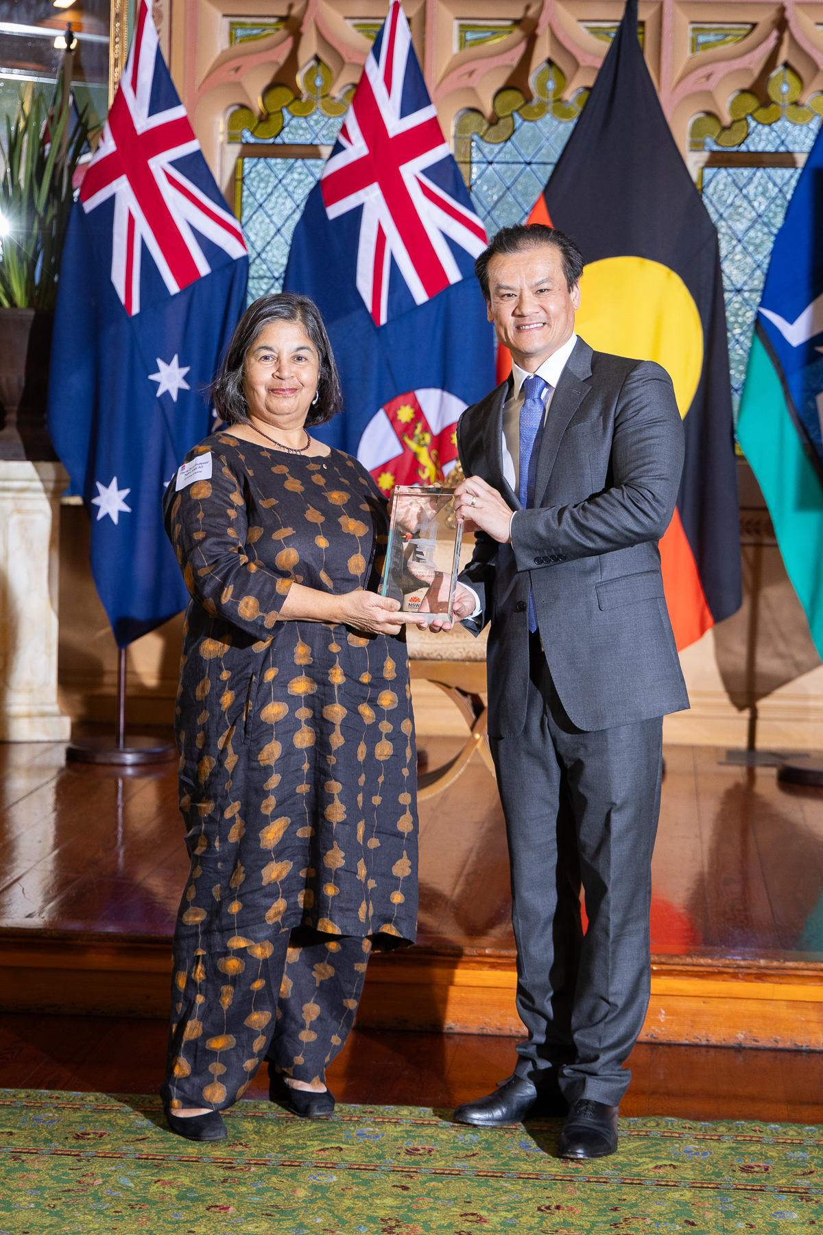 2025 NSW Scientist of the Year, Professor Nalini Joshi, receives her trophy from the Hon Anoulack Chanthivong MP, Minister for Innovation, Science and Technology