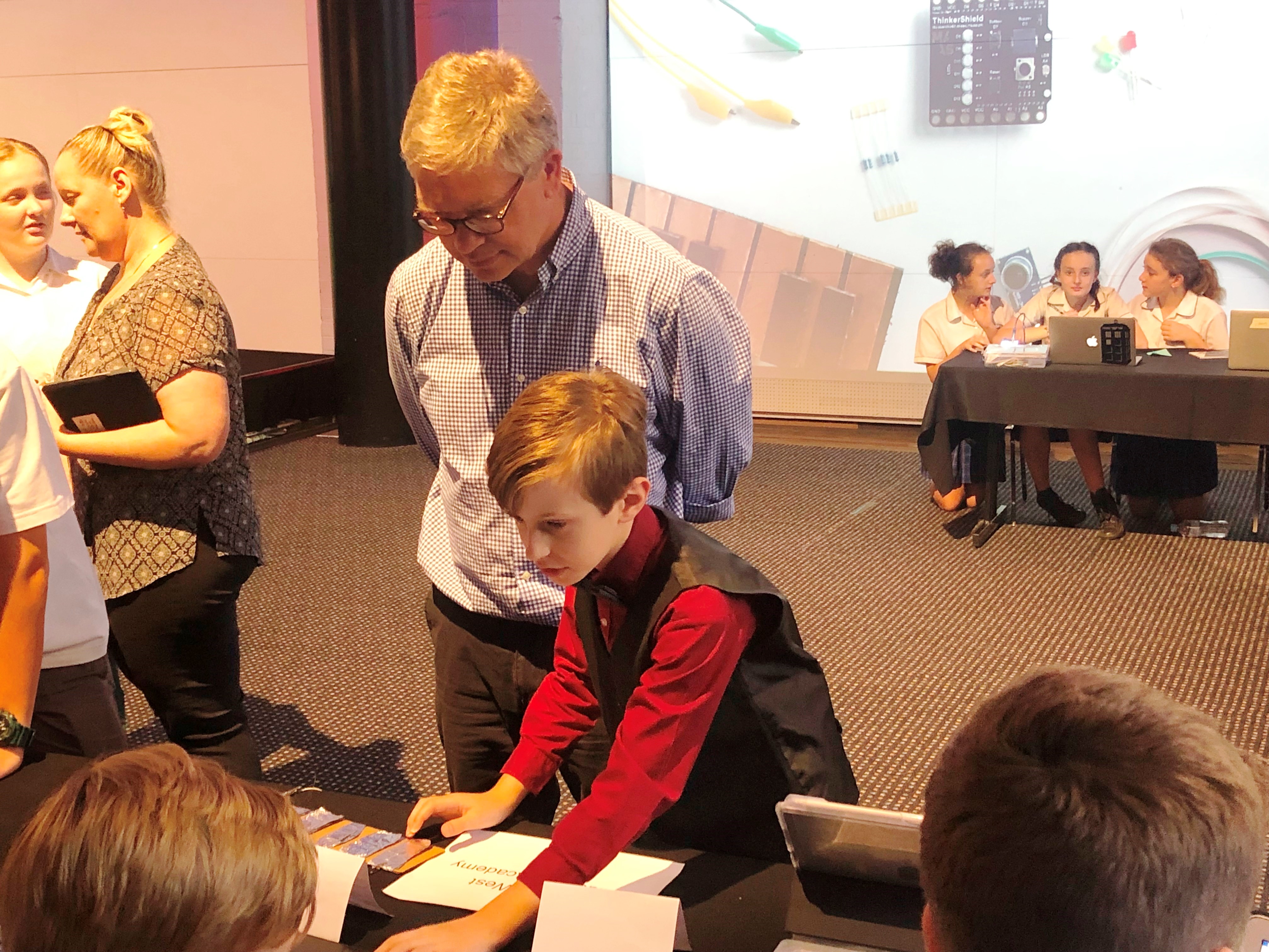 Professor Hugh Durrant-Whyte with student at the awards ceremony for the Premier's Coding Challenge, 18 December 2018